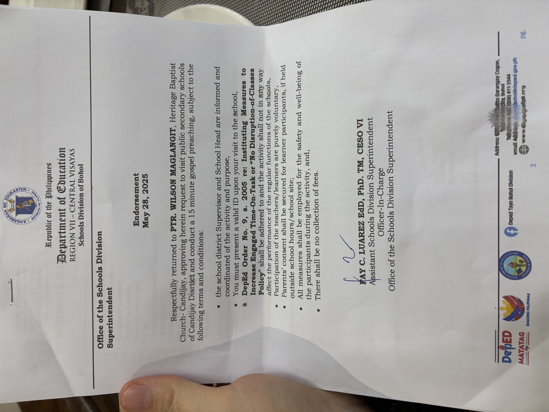 Signed Department of Education endorsement to Pastor Wilson Maglangit of Heritage Baptist Church Candijay, approving gospel visits to four Candijay high schools