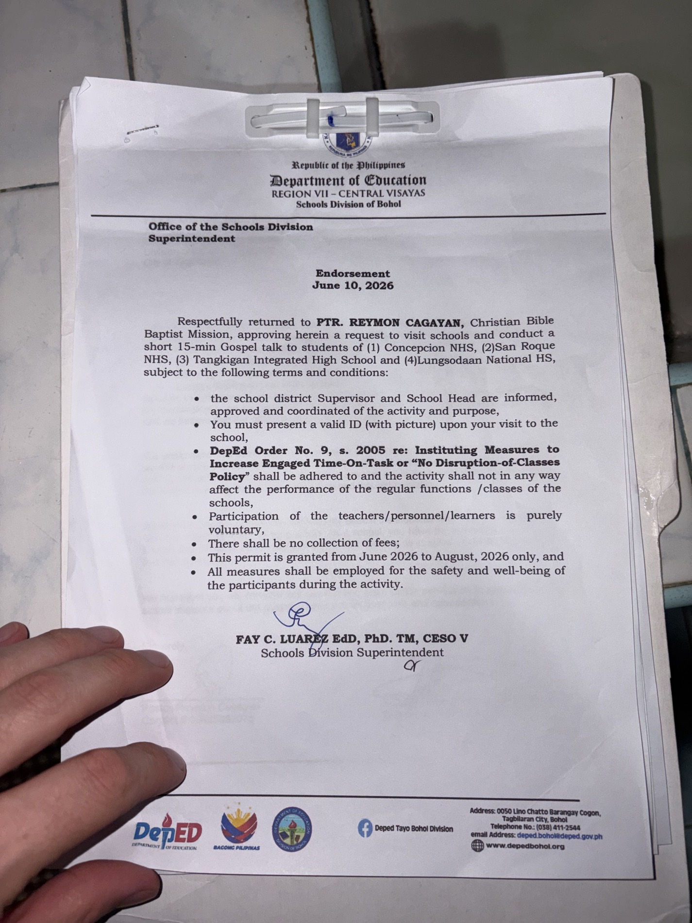 Signed Department of Education endorsement to Pastor Reymon Cagayan for the Mabini district, 2026 trip